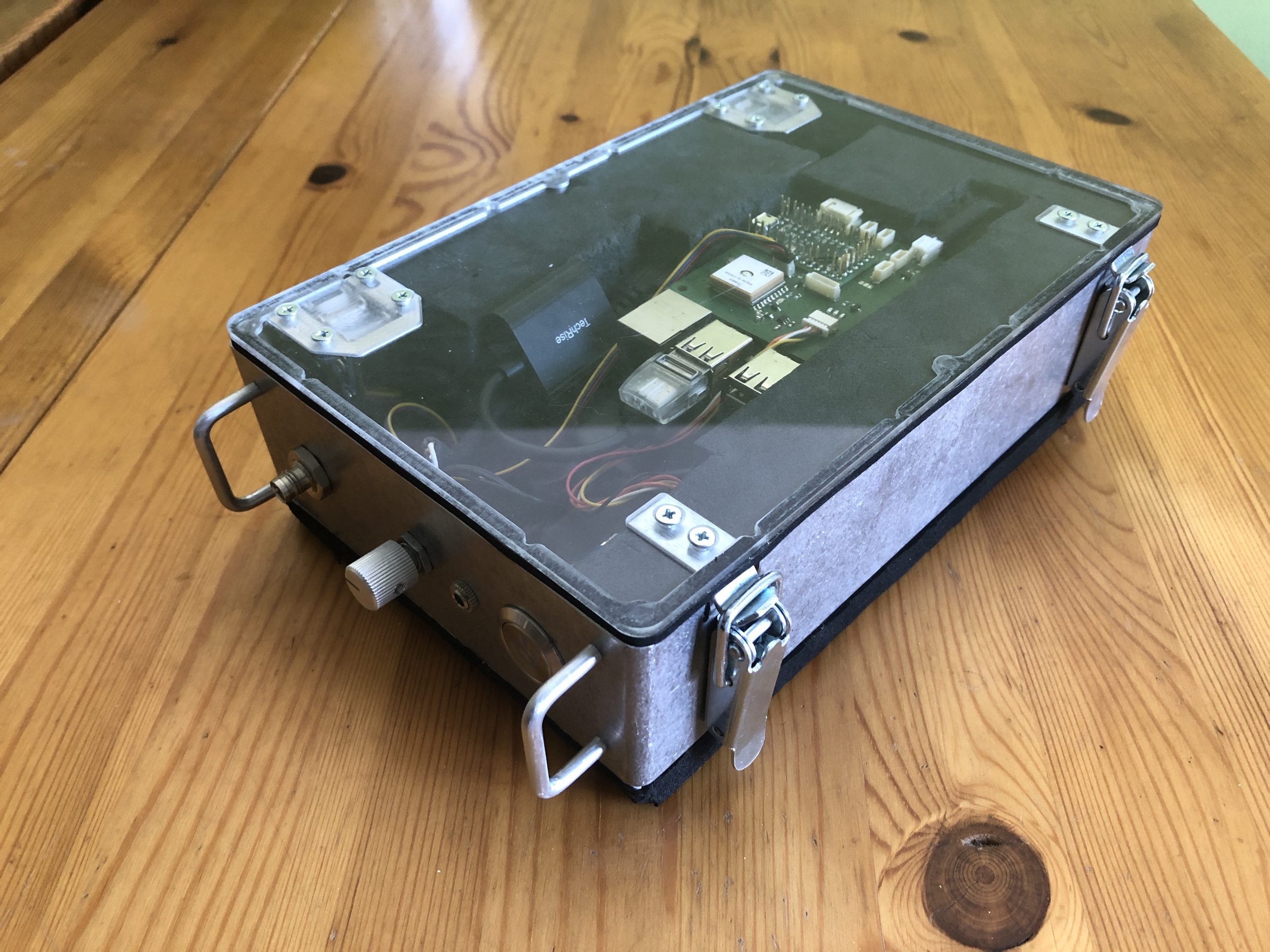 Enviro Bike kit - metalic box with clear lid showing electronic hardware inside